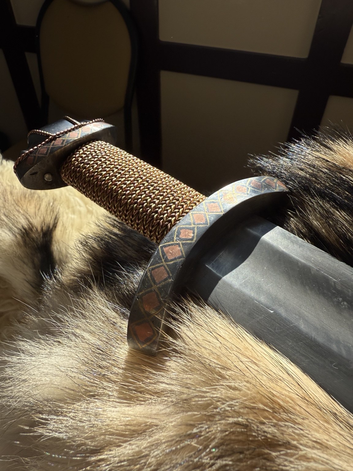 Copper and brass wire grip and curved lower guard