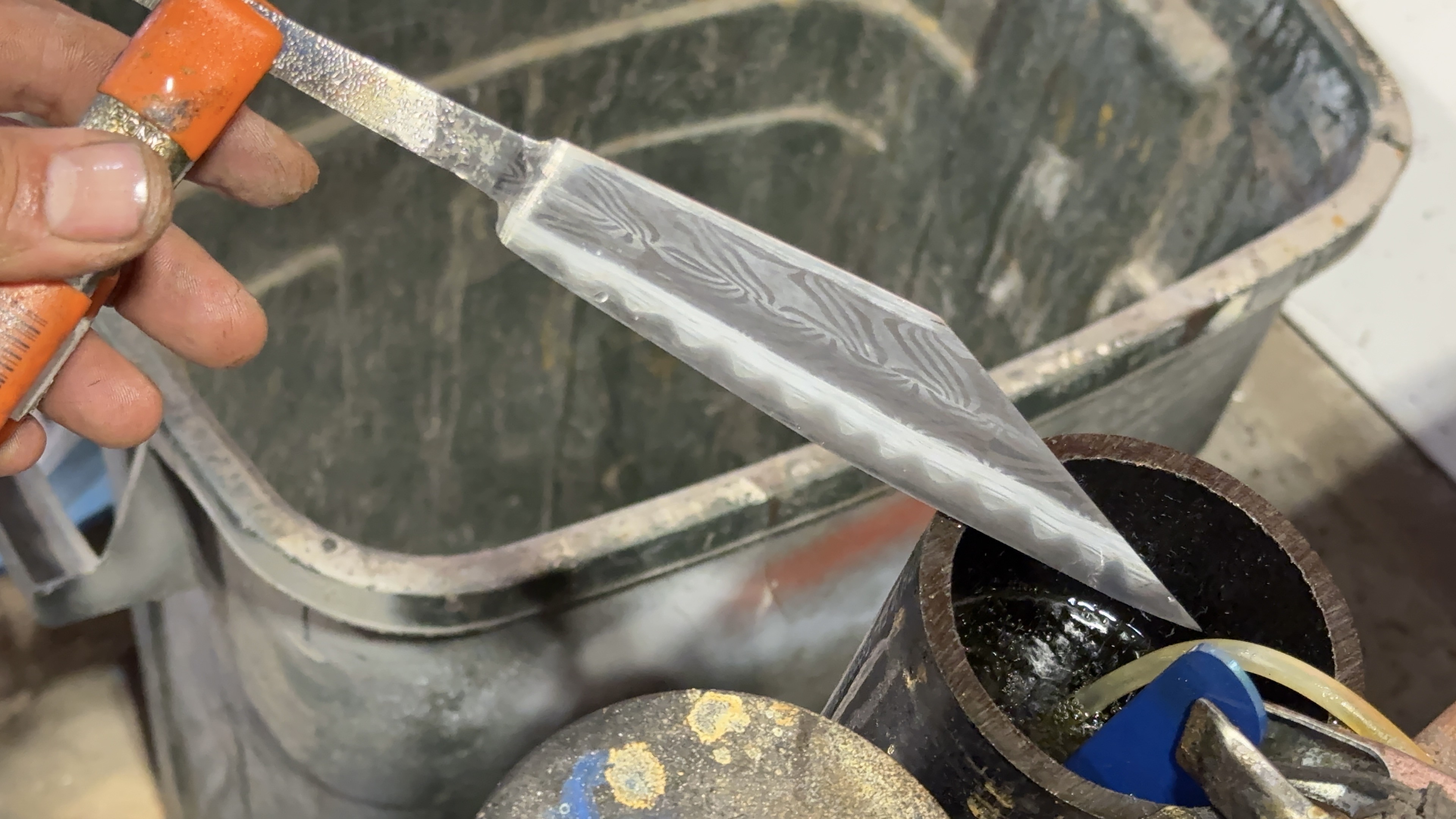 Bare seax blade after grinding and cleaning with developing etched pattern
